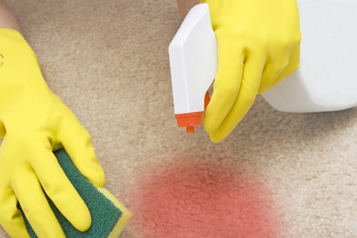 Carpet cleaning team in Collier Row using eco-friendly equipment and recycled materials