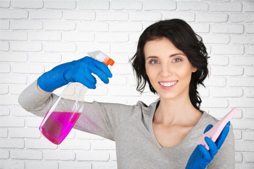 Professional carpet cleaning team following safe working practices